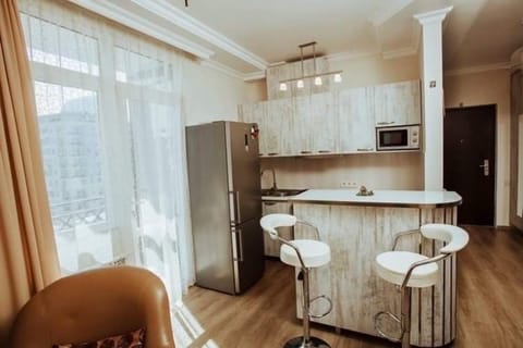 City Apartment | Living area | Flat-screen TV