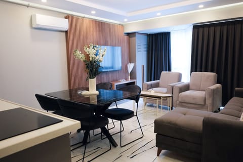 Family Suite, City View | Living area | LCD TV