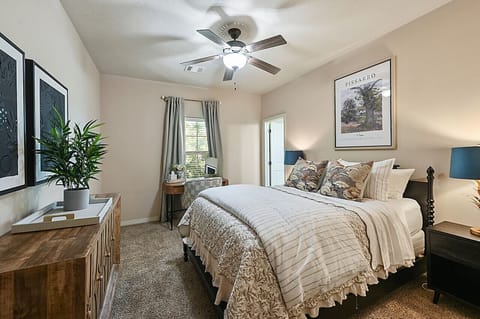 Queen bed, private bath offer comfort and convenience in serene space.