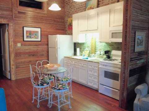Basic Suite, 1 King Bed with Sofa bed | Living area | Flat-screen TV