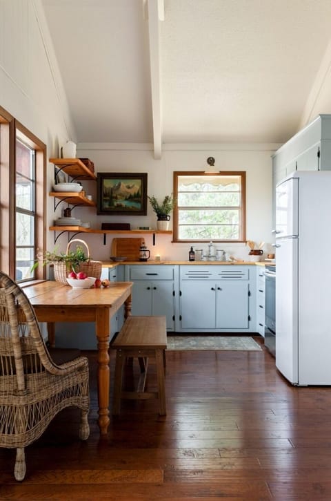 Indoor dining table next to the kitchen. Additional seating available