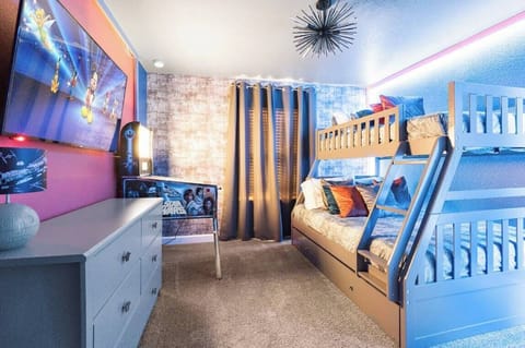 This bright and playful children's room features a stylish wooden bunk bed with colorful bedding, whimsical decor, and soft lighting, while warm textured walls and a plush carpet create a cozy atmosphere for restful nights.