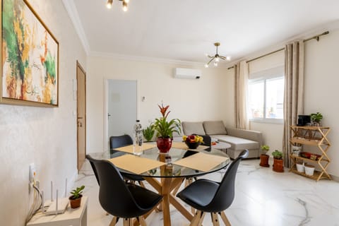 The spacious living area offers a place to gather and socialize with friends and family during your stay.
