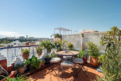 Relax and unwind on your private balcony featuring a table and chairs, perfect for enjoying a cup of coffee or a glass of wine in the fresh air.