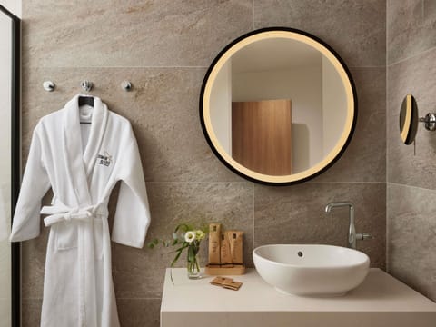 Pillowtop beds, free minibar, in-room safe, laptop workspace