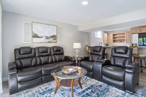 Theater style comfort in the lower level living room television area.