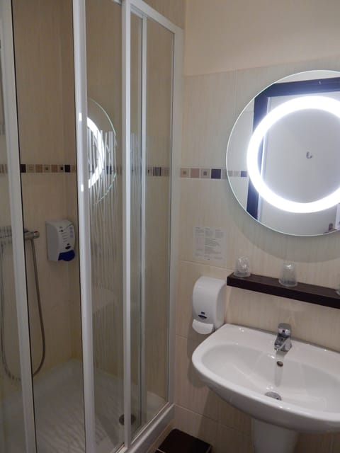 Shower, free toiletries, hair dryer, towels