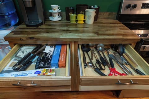 Cooking utensils and food wrap
Coffee bar includes coffee, tea, sugar and creamer.