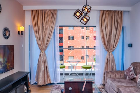 Classic Apartment | Living area | 55-inch Smart TV with cable channels, first-run movies