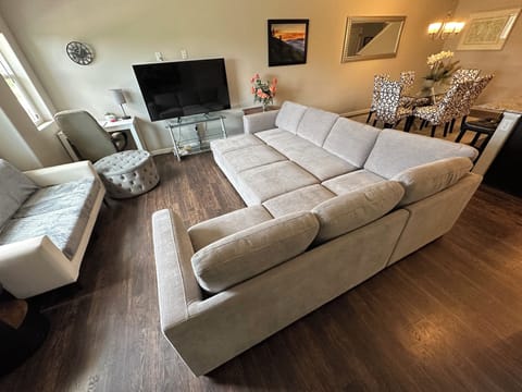 Living room with queen sleeper sofa unfolded