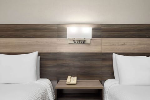 Desk, laptop workspace, blackout drapes, free cribs/infant beds