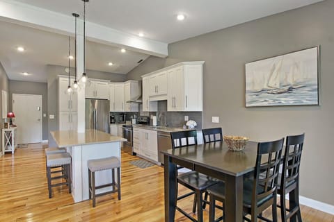 Island and dining table with seating for seven