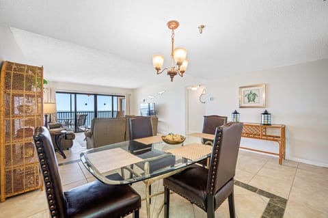Large open living & dining area with a gulf view