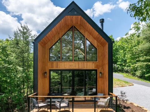 Sleek, modern, and unforgettable, Viking Hut stands out with its bold A-frame design, massive windows, and stunning natural surroundings. A stylish retreat built for two