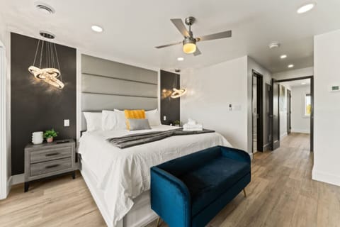 King Bedroom with Crisp white walls create a serene retreat.