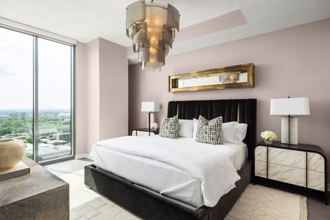 Primary suite with a king bed and a 55" 4K UHD TV