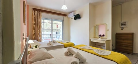 Classic Quadruple Room, Balcony, Garden View | In-room safe, desk, laptop workspace, soundproofing