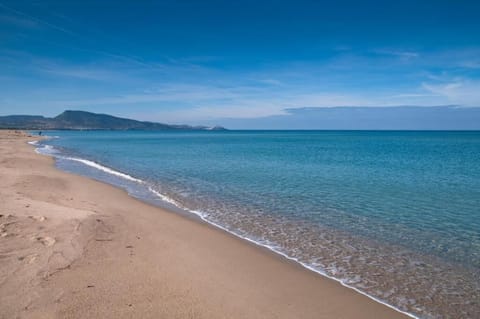 On the beach, white sand