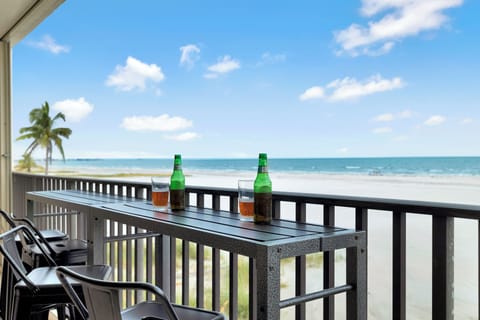 Outdoor lanai overlooking the beach. - Outdoor lanai overlooking the beach.