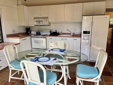 Kitchen, living & entry on upper level with bedroom 2, 3 and shared bathroom