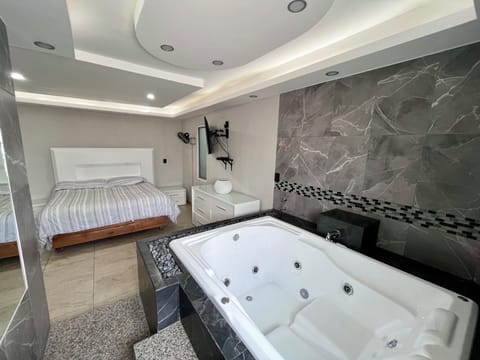 Romantic Room, Courtyard View | Bathroom | Shower, rainfall showerhead, towels, soap