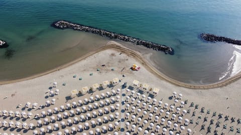 Private beach nearby, sun loungers, beach umbrellas