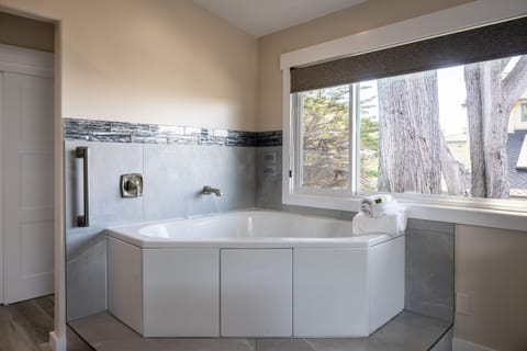 Suite, 1 King Bed, Jetted Tub, Partial Ocean View (Dunes Beach) | Iron/ironing board, free WiFi, bed sheets