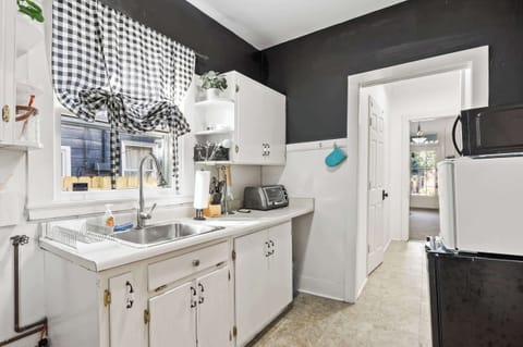 Kitchen: Whip up delicious meals in our charming kitchen. It's cozy, functional, and ready for your culinary adventures!