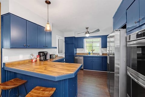 Full kitchen with brand new stainless steel appliances and dual coffee maker (Keurig on one side, drip coffee on the other side)