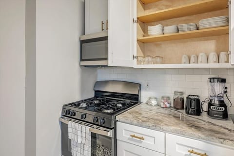 Fully stocked kitchen with counter height seating