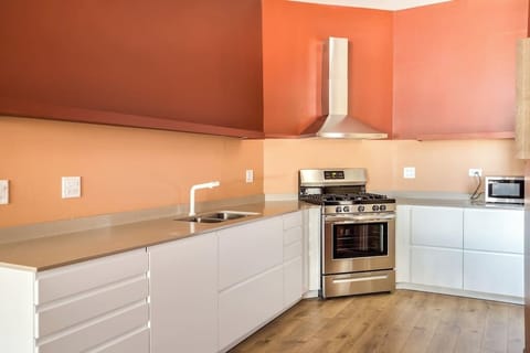 Living Room / Dining Room Combo with Fully stocked kitchen