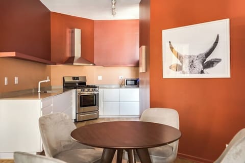 Living Room / Dining Room Combo with Fully stocked kitchen