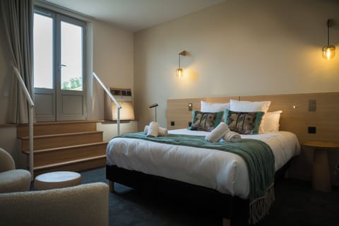 Deluxe Room | Premium bedding, pillowtop beds, individually decorated