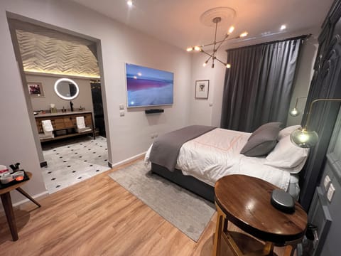 Premium Double Room | Minibar, in-room safe, blackout drapes, iron/ironing board