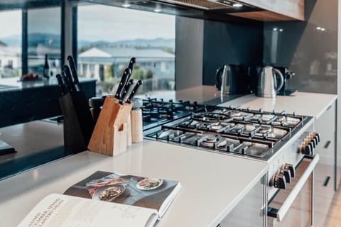 Open kitchen with all necessary cooking items provided, fully equipped to accommodate a group 