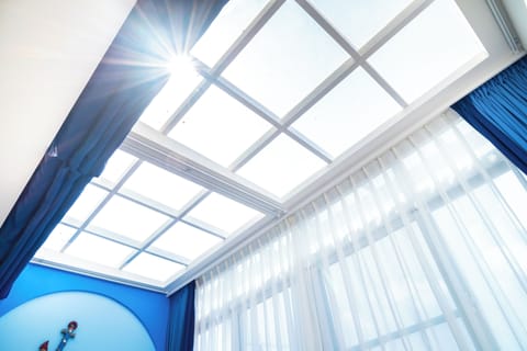 Exclusive Quadruple Room, Multiple Beds, Ensuite, Tower | Living area | 43-inch TV with cable channels, heated floors