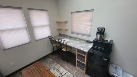 Counter top workspace, mini fridge, microwave and 12 cup coffee pot