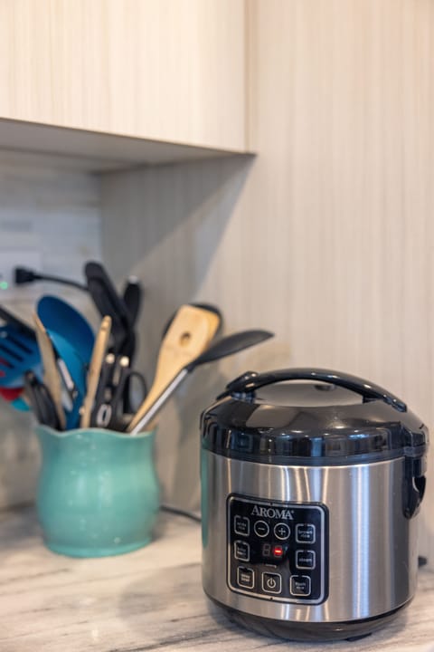 All the tools you need for cooking are ready for you, including a rice cooker