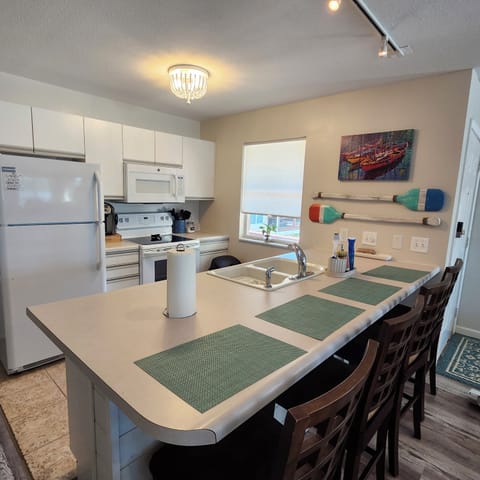 Kitchen with bar stools