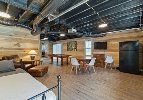 Hangout downstairs with TV, Fridge and Mini Pool Table