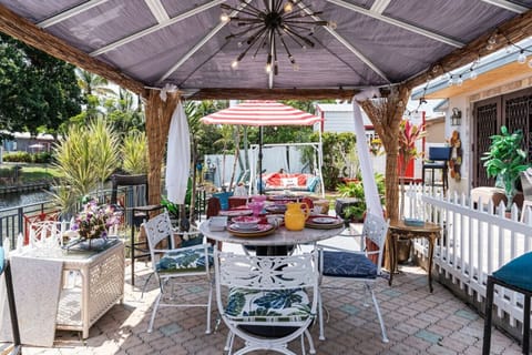 Welcome to our gorgeous waterfront, Canal home, offering an inspiring view of nature, with fish, butterflies, ducks, and turtles, creating a tranquil and relaxing atmosphere. Sit back, lounge, enjoy a barbecue with your family and friends gathering a