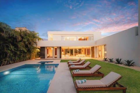Bask in the glow of the Riviera Maya in our private backyard. Complete with 6 luxurious sun loungers, pristine pool, furnished terrace with iconic Tulum-style swing, outdoor jacuzzi, and grassy garden area. This is the ONLY private pool in the area!