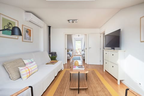 Apartment, 2 Bedrooms | Living room | Flat-screen TV