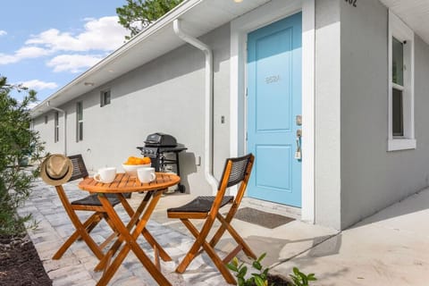 Gas grill and bistro seating outside - perfect for morning coffee.