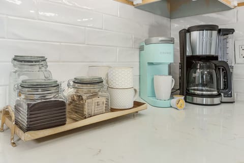 Fully equipped coffee station with Keurig, Filter coffee machine, and French Press. Starter amounts of coffee, pods and sugar provided.