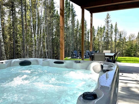 Let the bubbles set the mood, relax under the forest canopy.