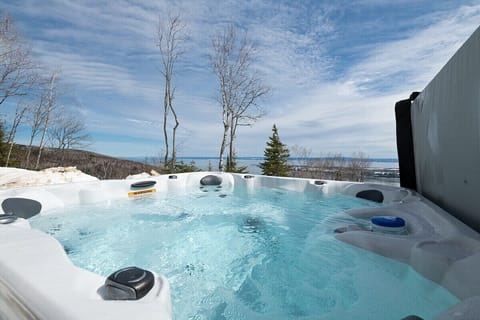 Soak in the river view, this spa was made for moments like these.