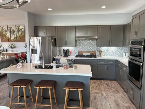 Gourmet kitchen comes with everything you’ll need for your monthly stay