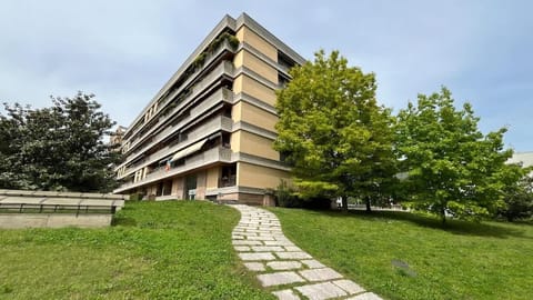 Exterior of the apartment, the small square and its gardens