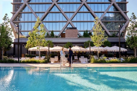 Seasonal outdoor pool, open 9:00 AM to 7:00 PM, sun loungers